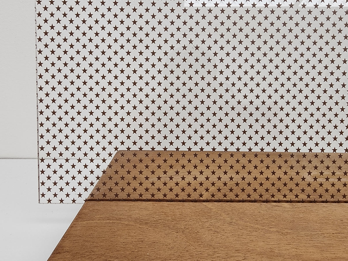 PatternPly® Scattered School Stars BROWN sheet showing the pattern