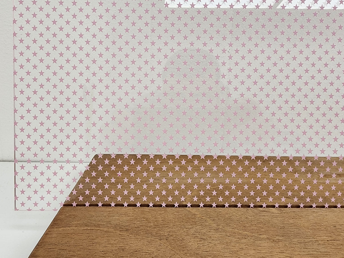 PatternPly® Scattered School Stars LIGHT PINK sheet showing the pattern
