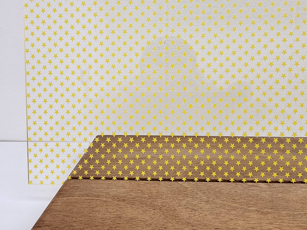 PatternPly® Scattered School Stars YELLOW sheet showing the pattern