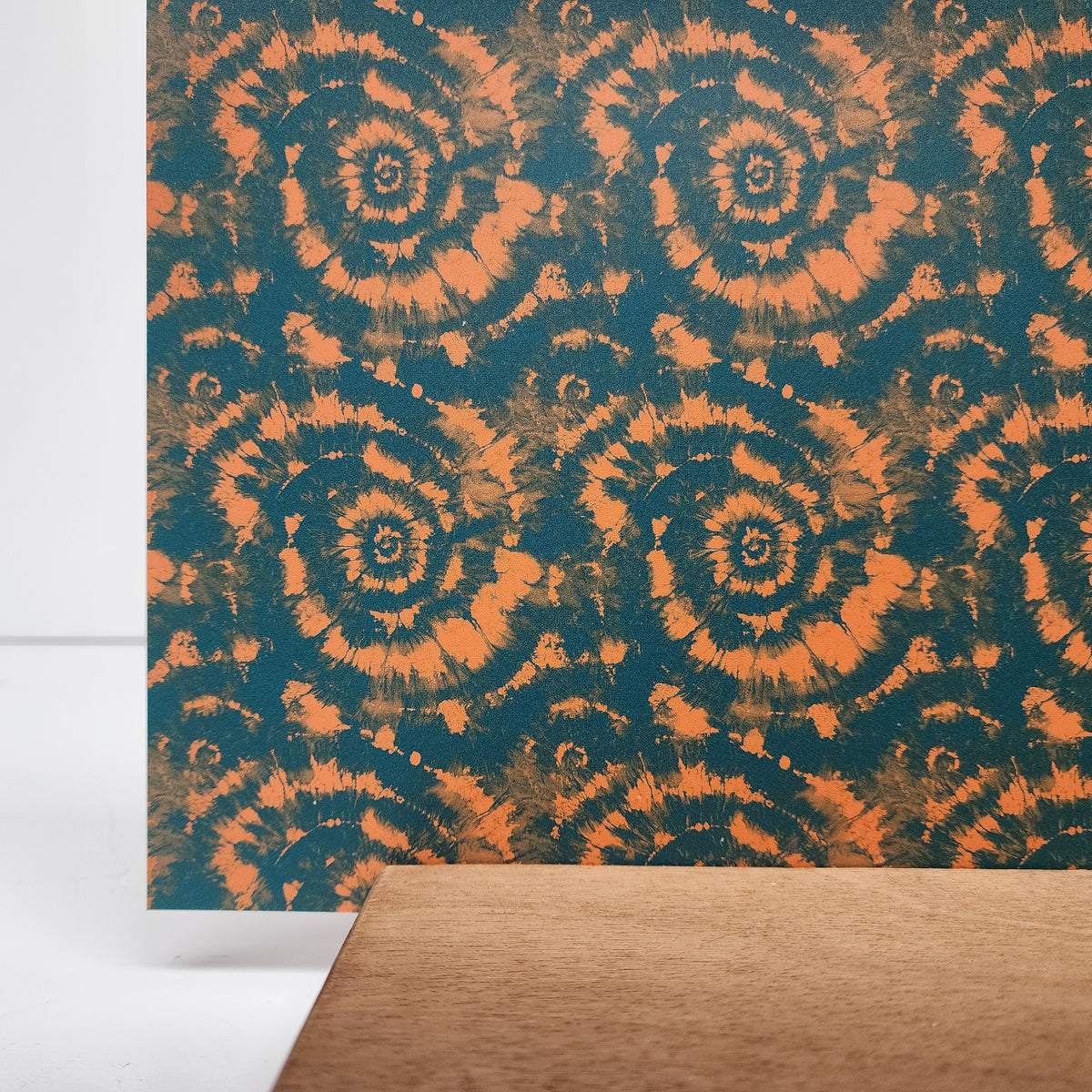 PatternPly® Full Coverage Teal and Orange Tie Dye sheet showing the pattern
