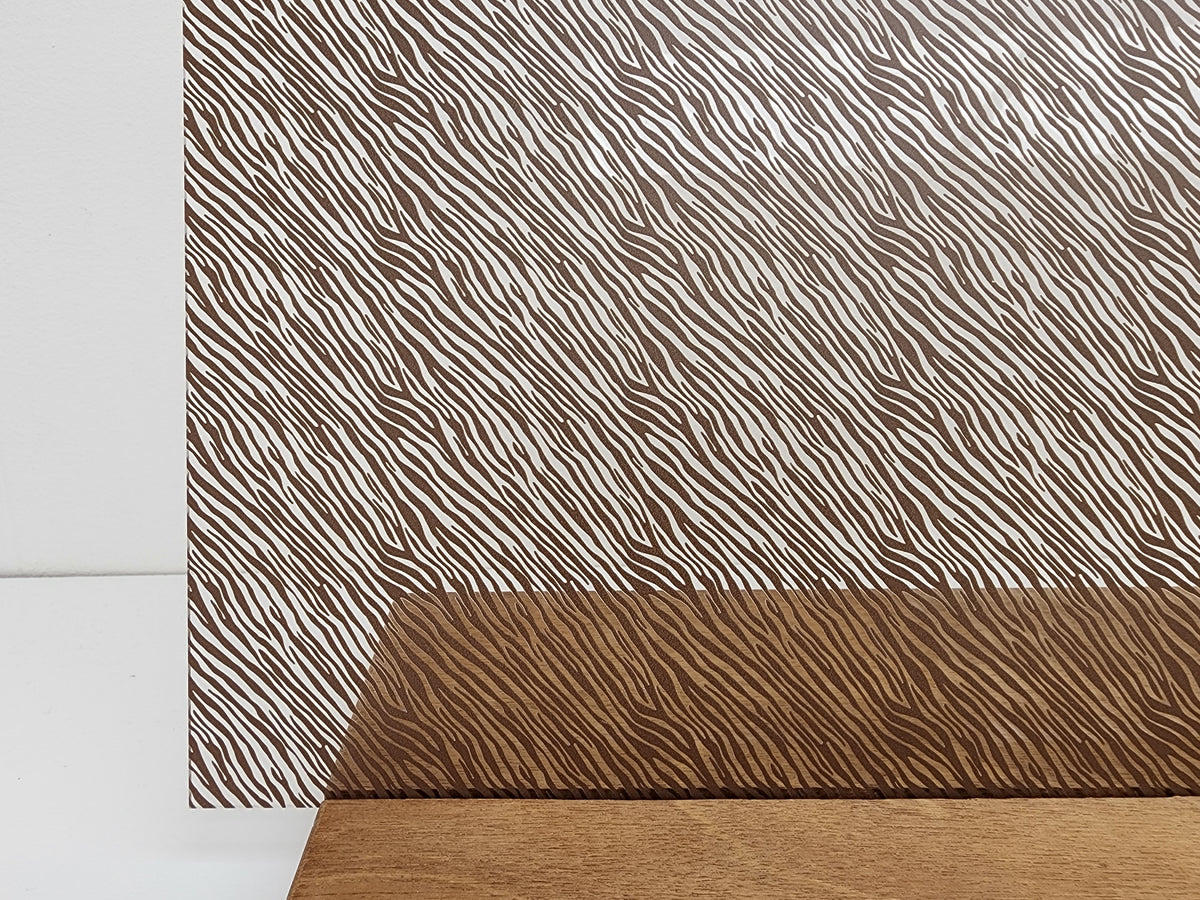 PatternPly® Scattered Zebra BROWN sheet showing the pattern