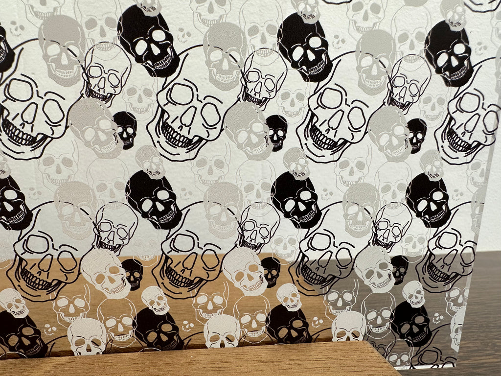 PatternPly® Scattered Black and White Skulls sheet showing the pattern