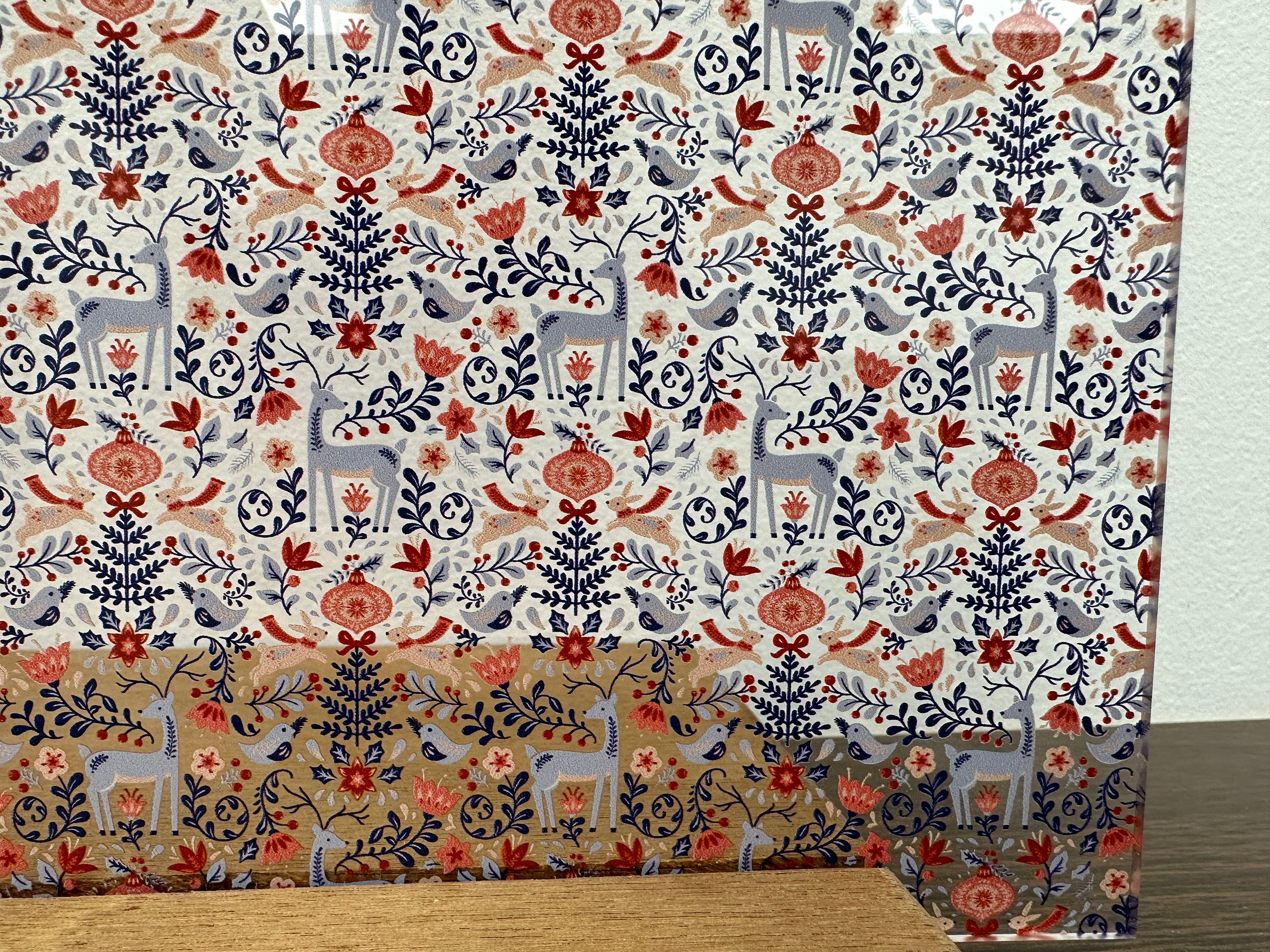 PatternPly® Scattered Blue, Pink, and Red Christmas Forest sheet showing the pattern