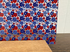 PatternPly® Scattered Red, White, and Blue Floral sheet showing the pattern