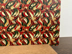 PatternPly® Full Coverage Abstract Red, Green, and Gold sheet showing the pattern