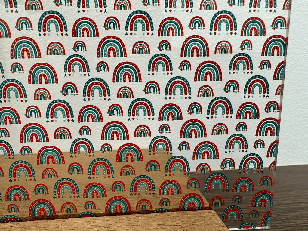 PatternPly® Scattered Micro Christmas Rainbows sheet showing the pattern