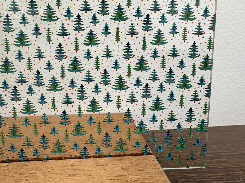 PatternPly® Scattered Micro Christmas Trees and Rainbow Snow sheet showing the pattern