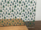 PatternPly® Scattered Micro Christmas Trees and Rainbow Snow sheet showing the pattern