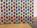 PatternPly® Scattered Rainbow Gradient Skulls sheet showing the pattern
