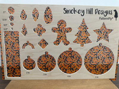 PatternPly® Scattered Orange and Black Bubbles
