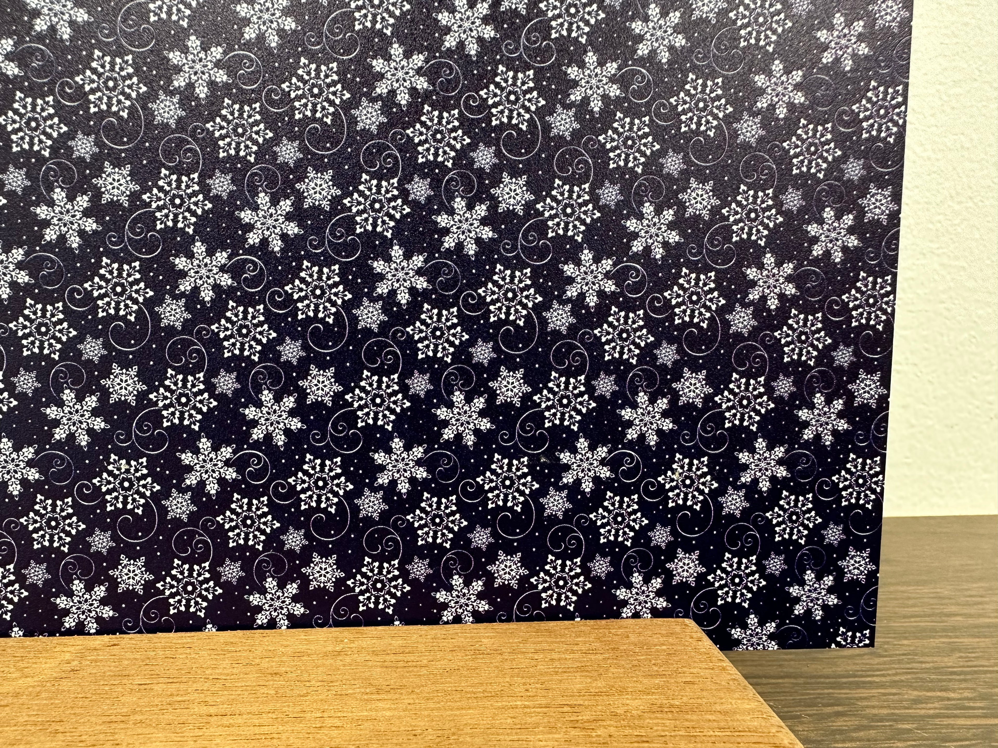 PatternPly® Full Coverage Navy and White Snowflake Swirls sheet showing the pattern