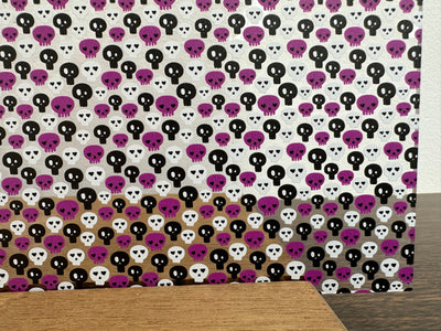 PatternPly® Scattered Purple, Black, and White Skulls