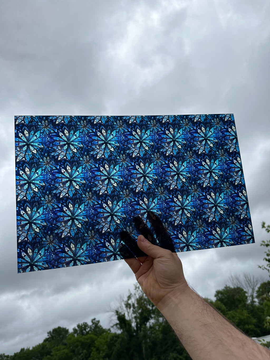 PatternPly® Transparent Blue Stained Glass Snowflakes sheet showing the pattern