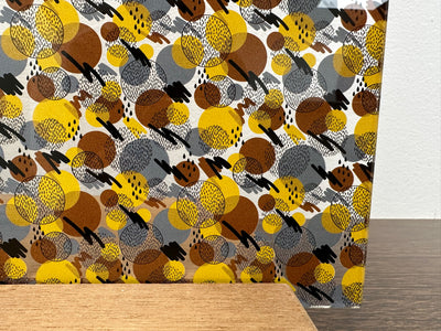 PatternPly® Scattered Yellow, Gray, and Brown 80s Circles