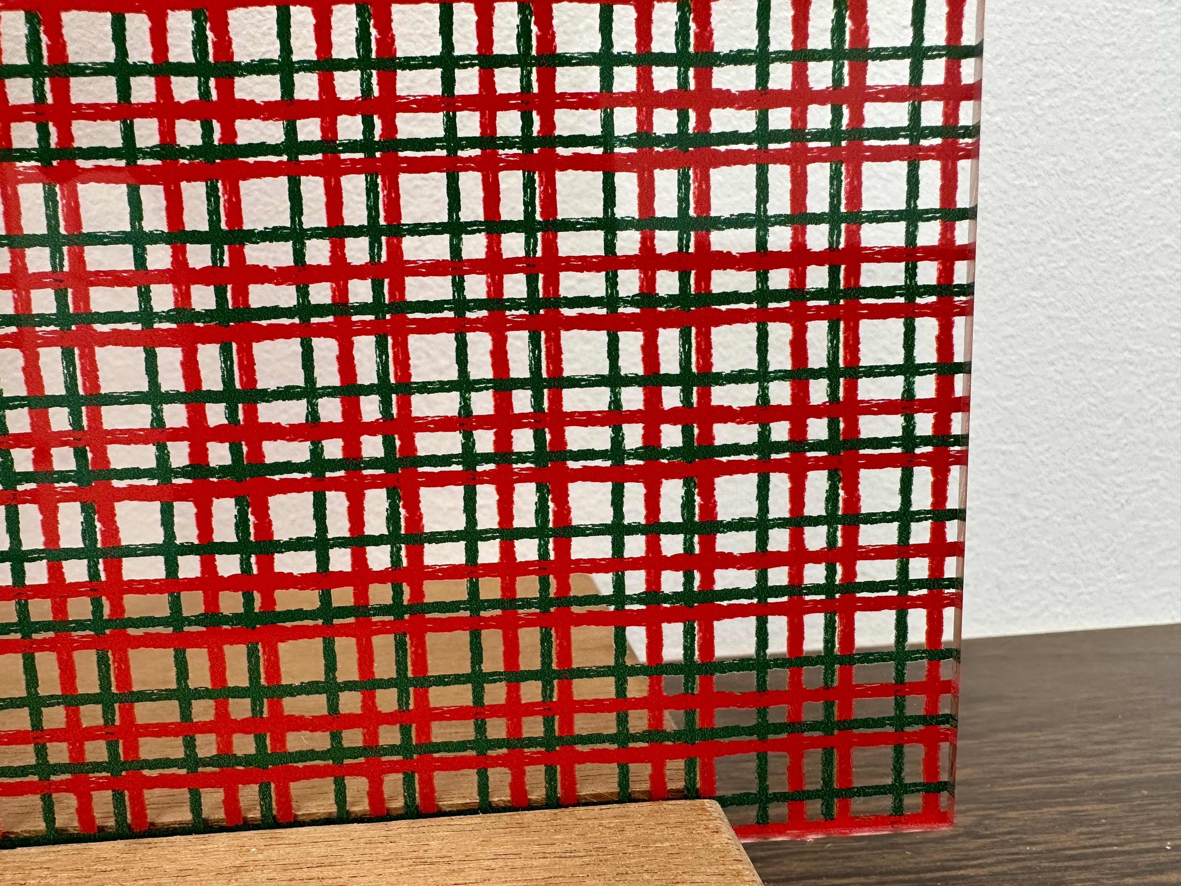 PatternPly® Scattered Red and Green Plaid sheet showing the pattern