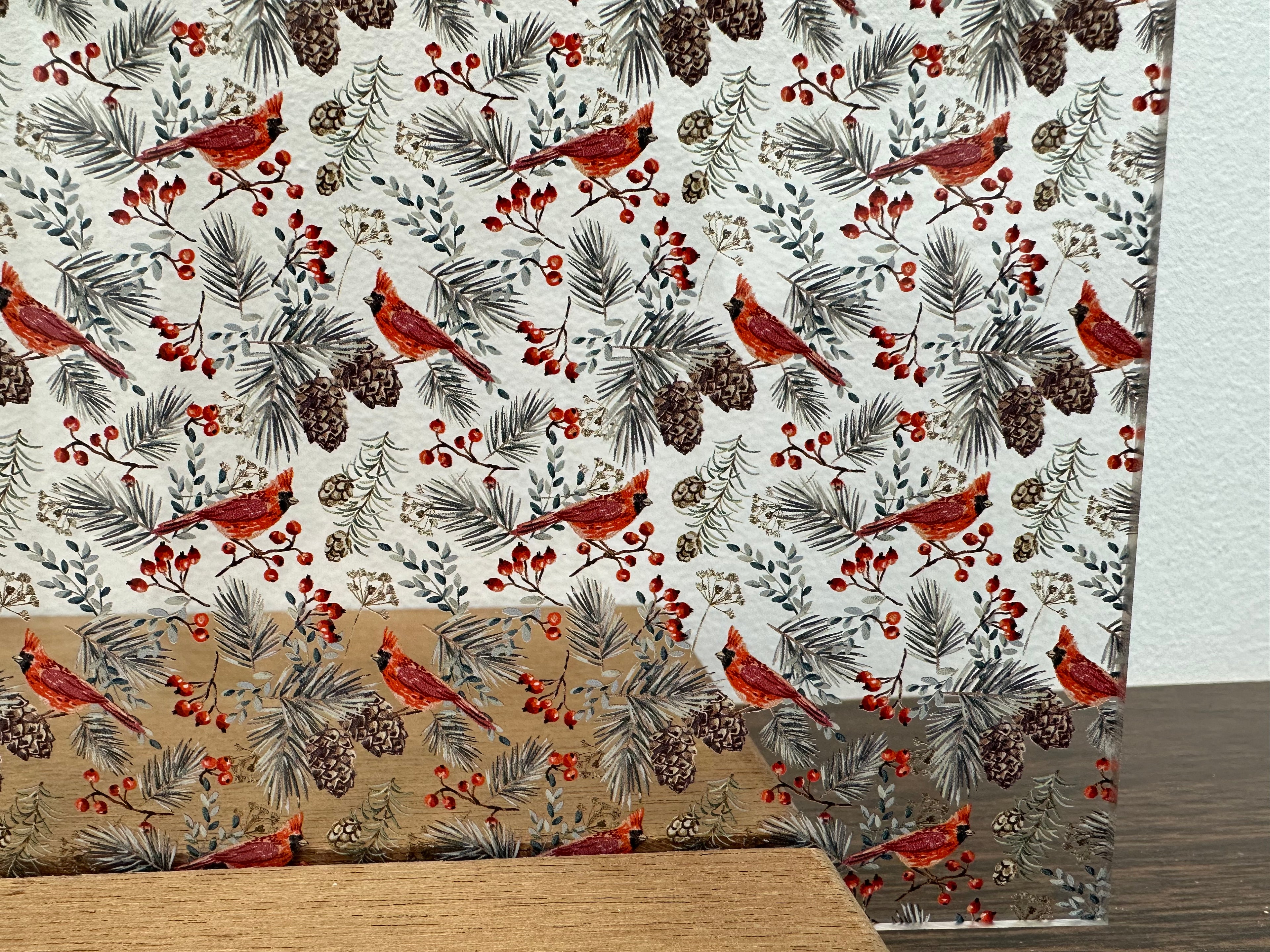 PatternPly® Scattered Cardinals and Pinecones sheet showing the pattern