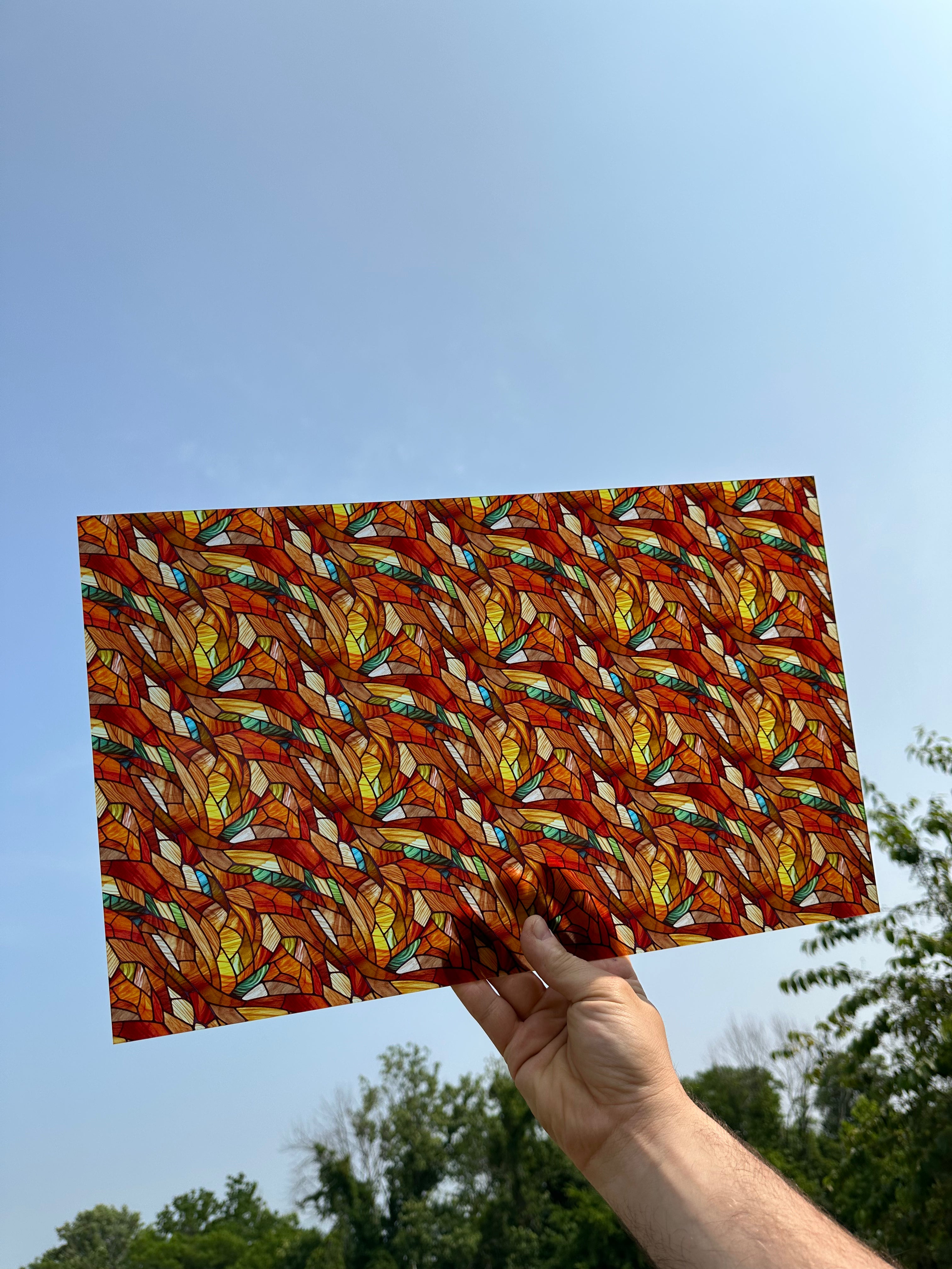 PatternPly® Transparent Wood Grains Stained Glass sheet showing the pattern