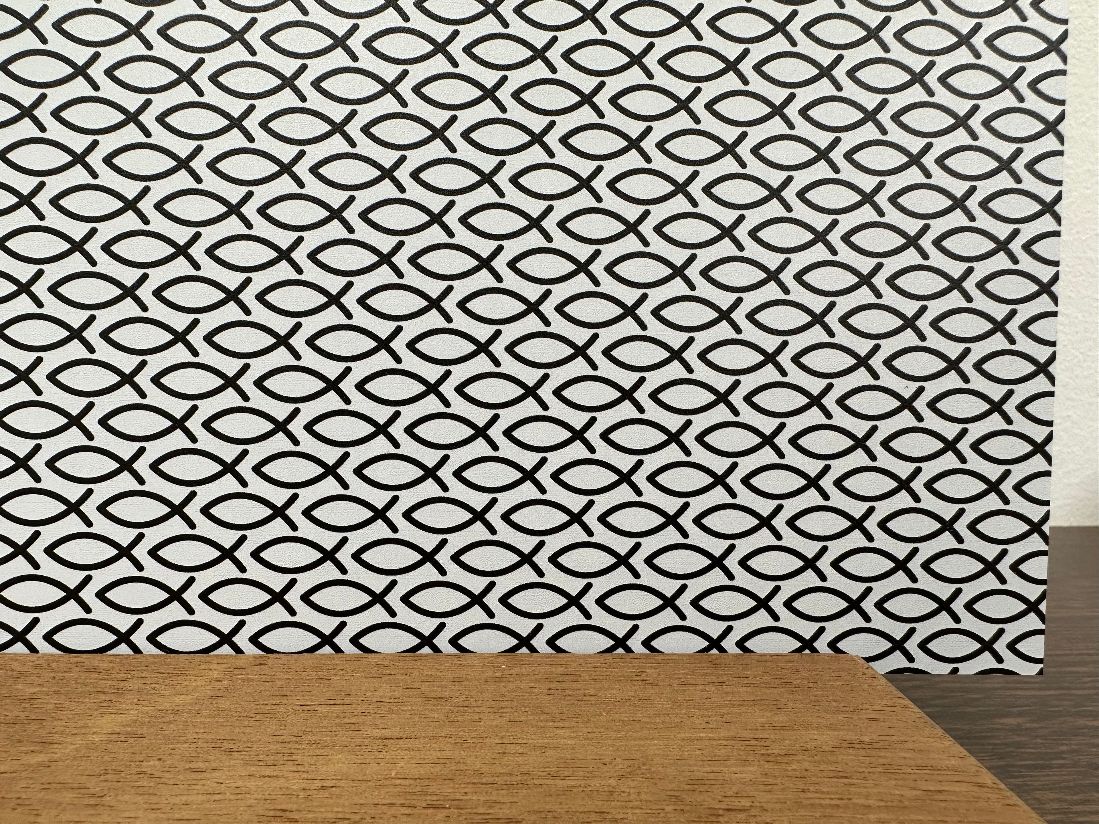 PatternPly® Full Coverage Black and White Jesus Fish sheet showing the pattern