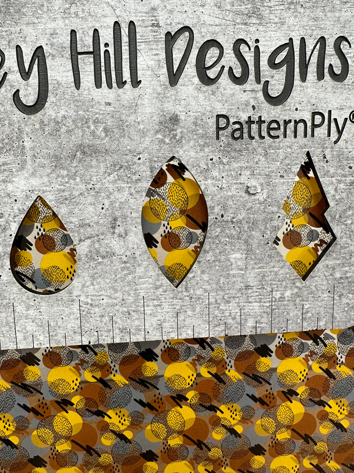 PatternPly® Scattered Yellow, Gray, and Brown 80s Circles