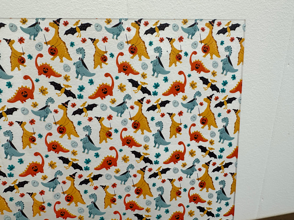 PatternPly® Scattered Halloween Dinosaurs sheet showing the pattern
