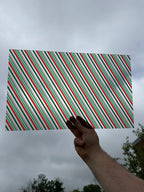 PatternPly® Transparent Green and Red Candy Cane sheet showing the pattern