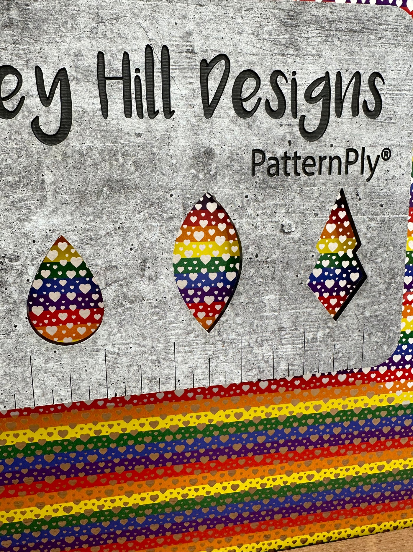 PatternPly® Scattered Rainbow Stripe Hearts