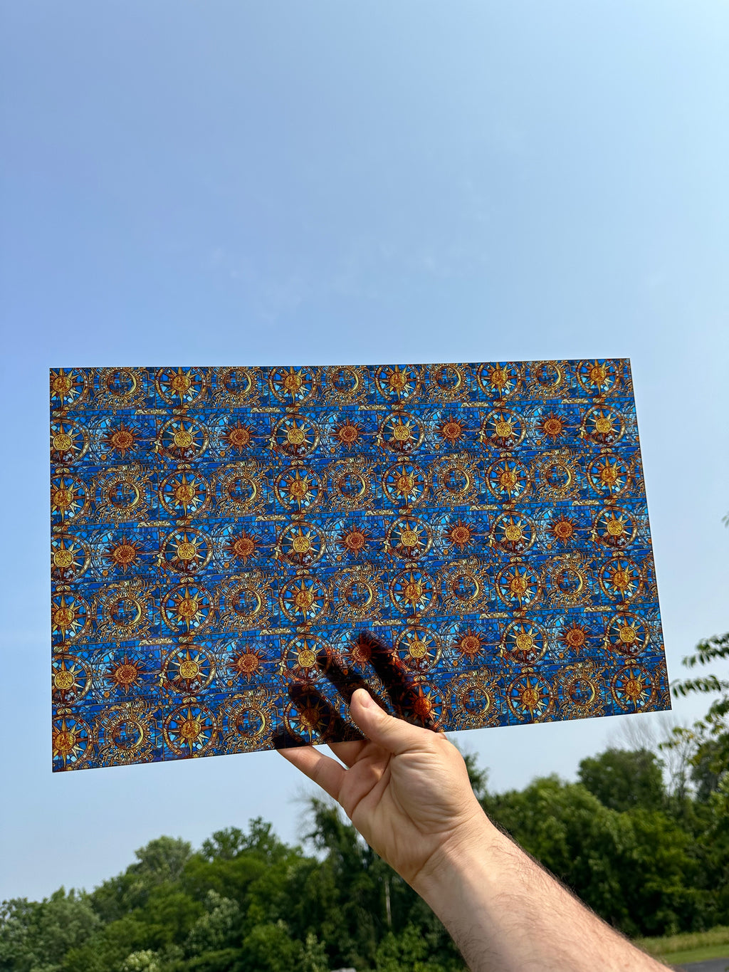 PatternPly® Transparent Celestial Suns Stained Glass sheet showing the pattern