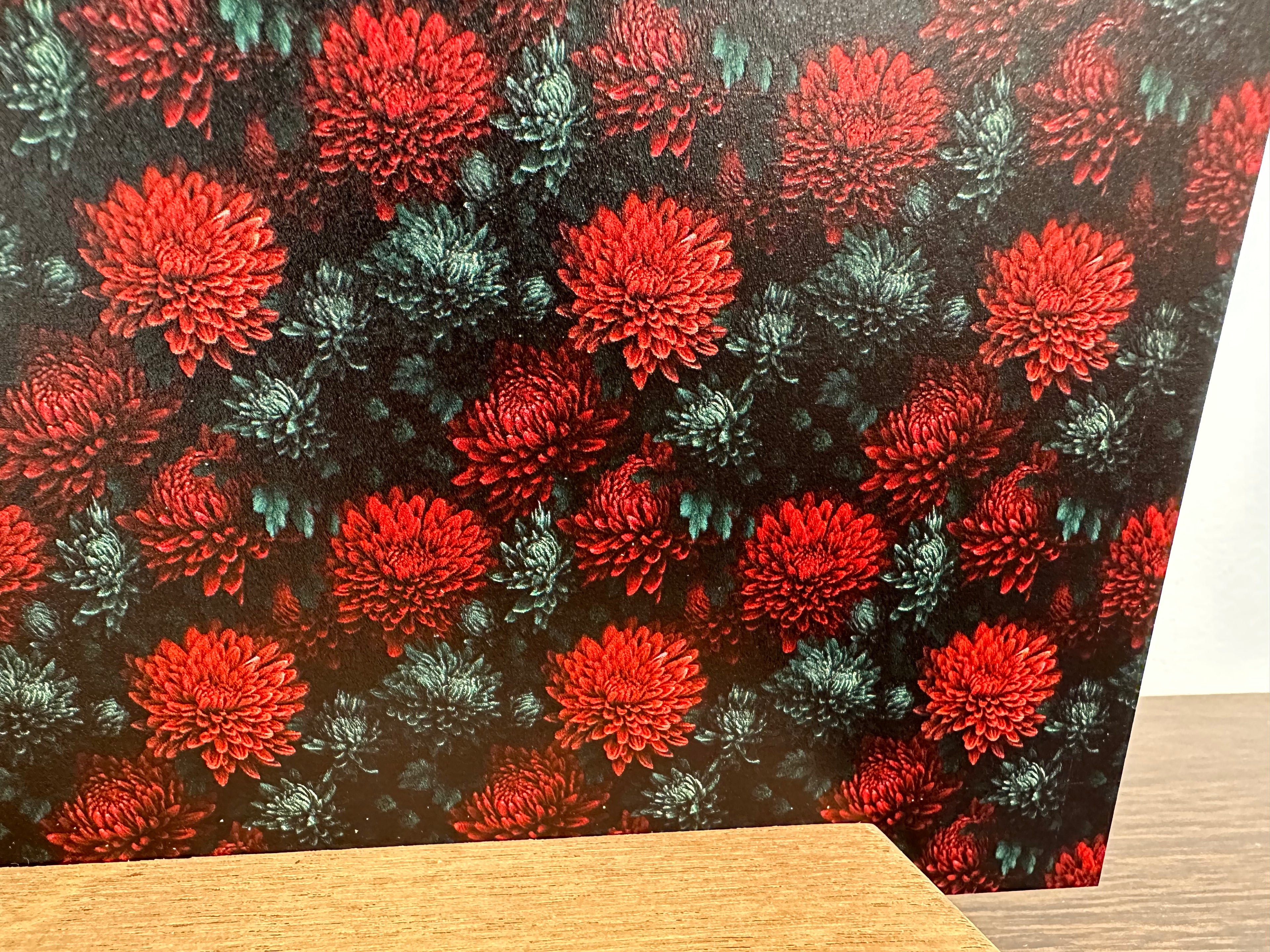 PatternPly® Full Coverage Red and Green Christmas Mums sheet showing the pattern