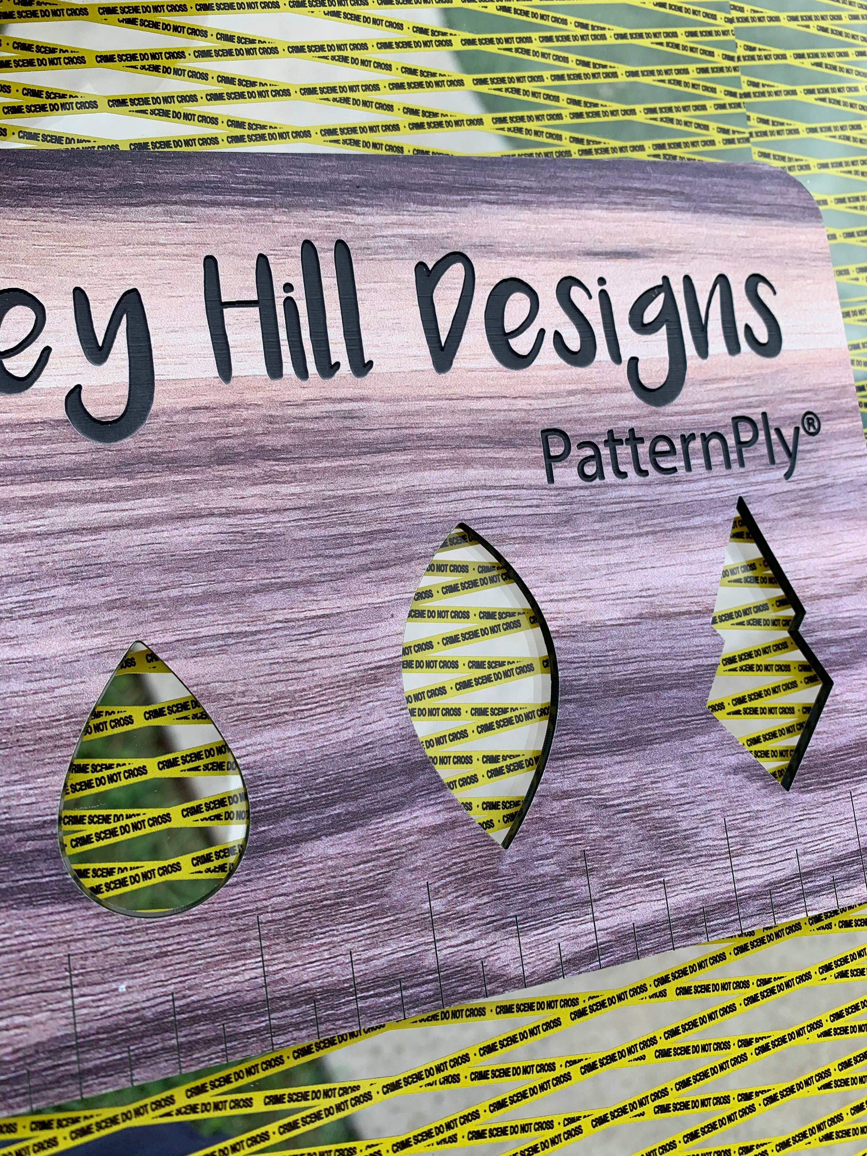 PatternPly® Scattered Micro Crime Scene Tape sheet showing the pattern