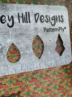 PatternPly® Scattered Christmas Words sheet showing the pattern