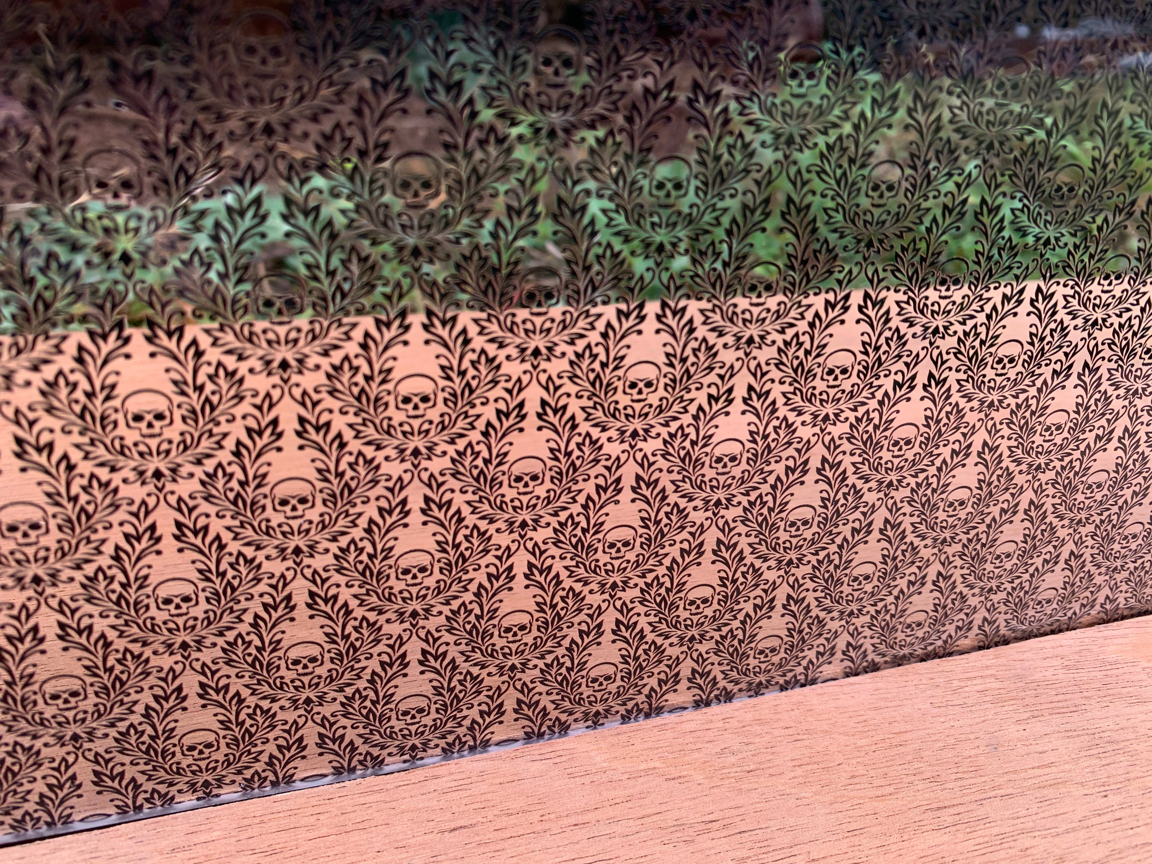 PatternPly® Scattered Skull and Leaf sheet showing the pattern