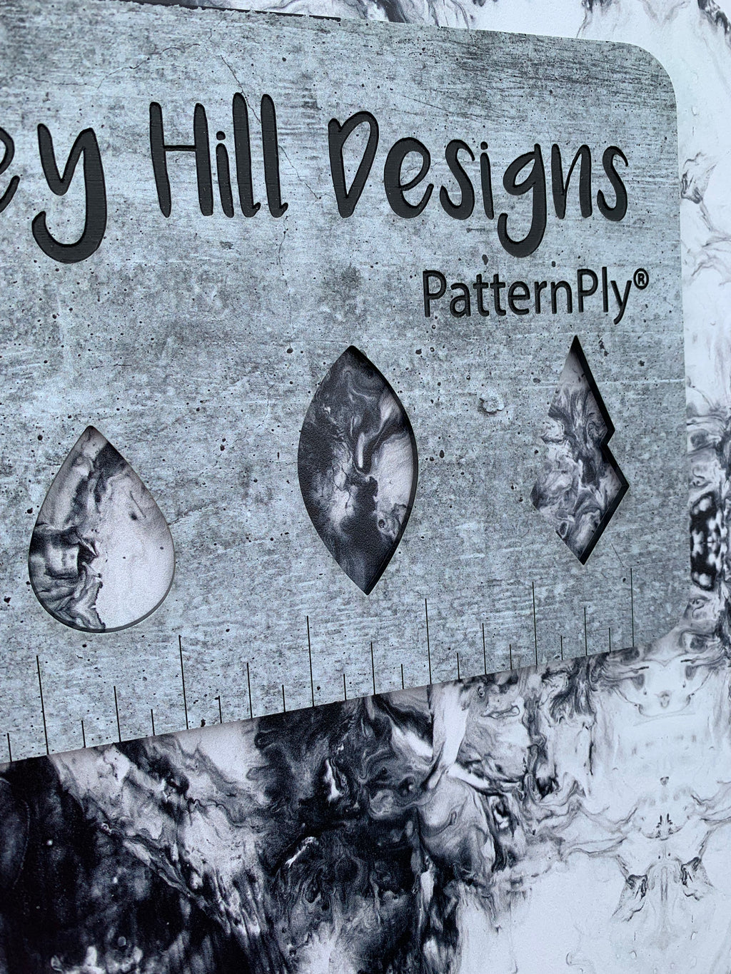 PatternPly® Full Coverage Black and White Smoky Swirls sheet showing the pattern