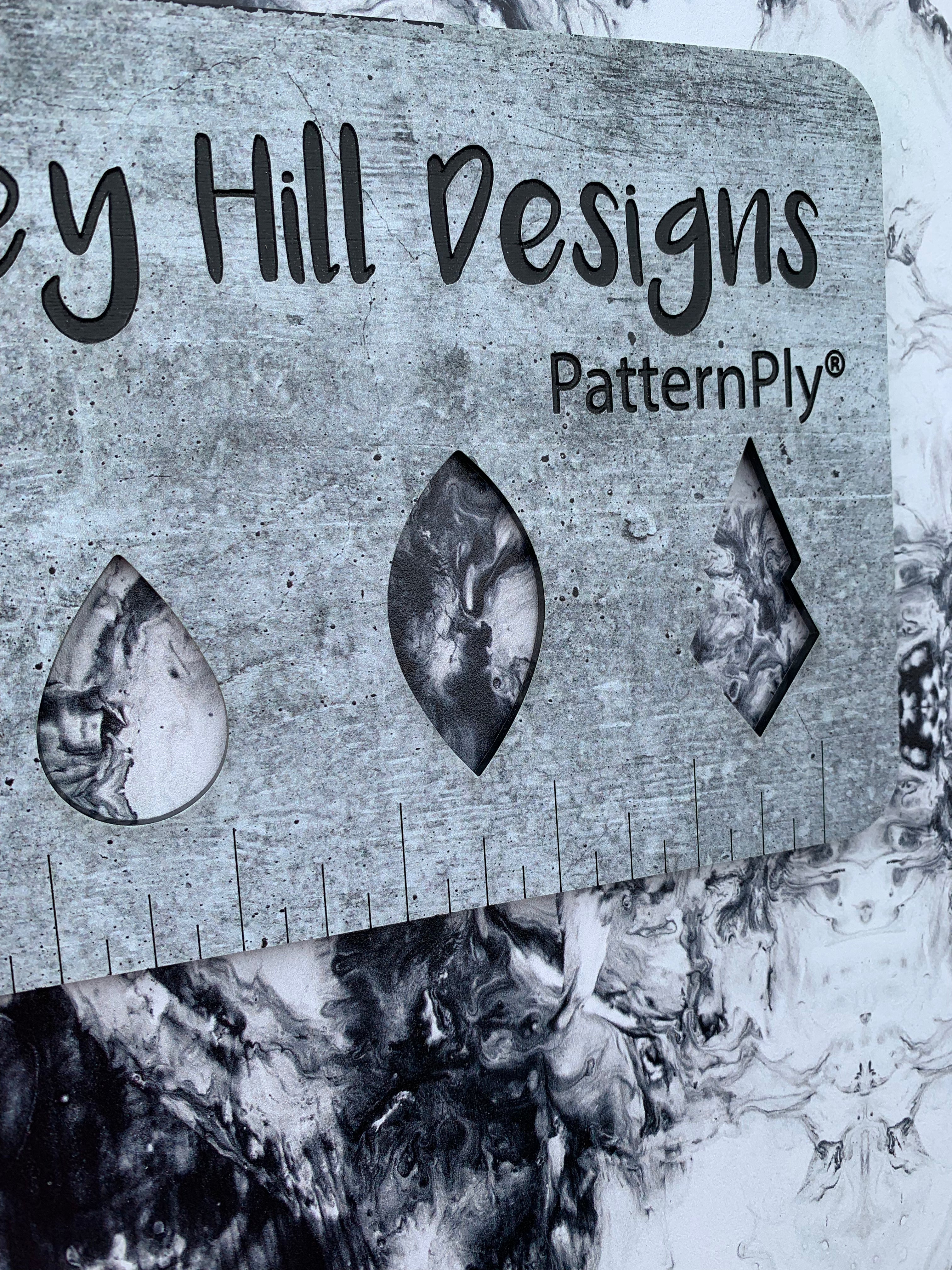 PatternPly® Full Coverage Black and White Smoky Swirls sheet showing the pattern