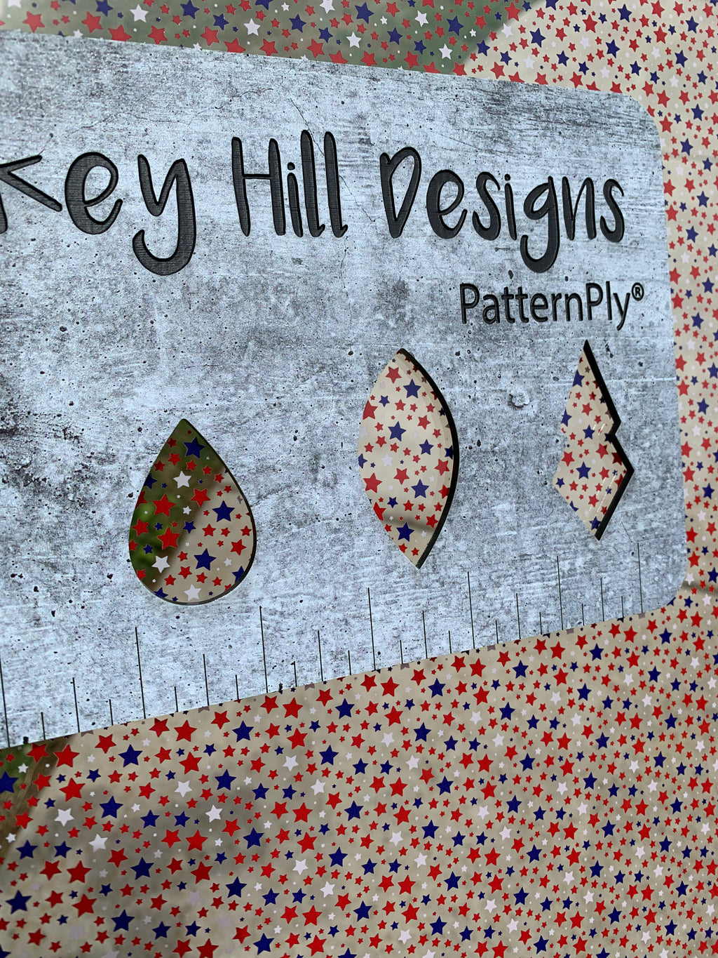 PatternPly® Scattered Red, White, and Blue Star Confetti sheet showing the pattern