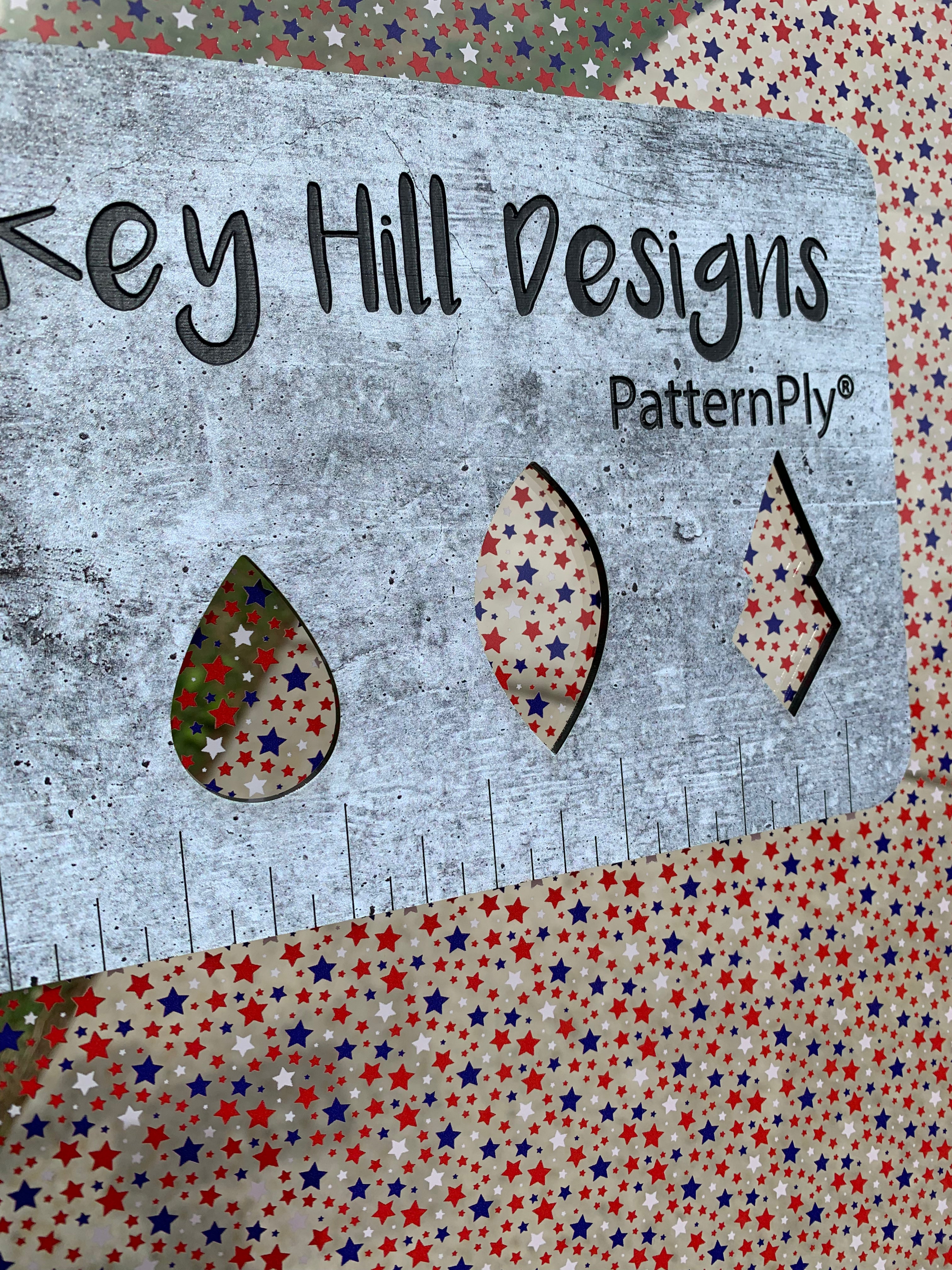 PatternPly® Scattered Red, White, and Blue Star Confetti sheet showing the pattern