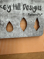 PatternPly® Full Coverage Micro Orange Gingham sheet showing the pattern