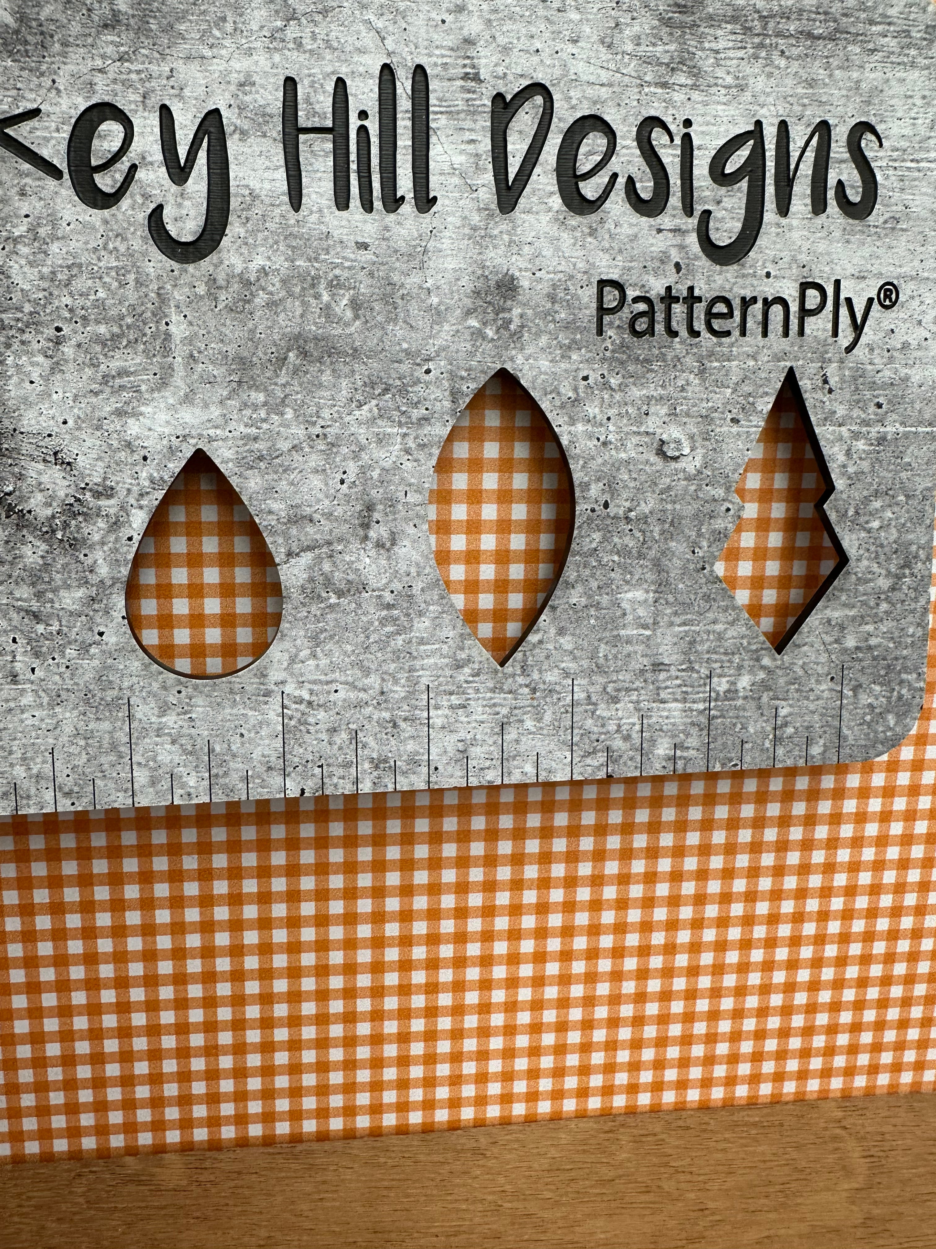PatternPly® Full Coverage Micro Orange Gingham sheet showing the pattern
