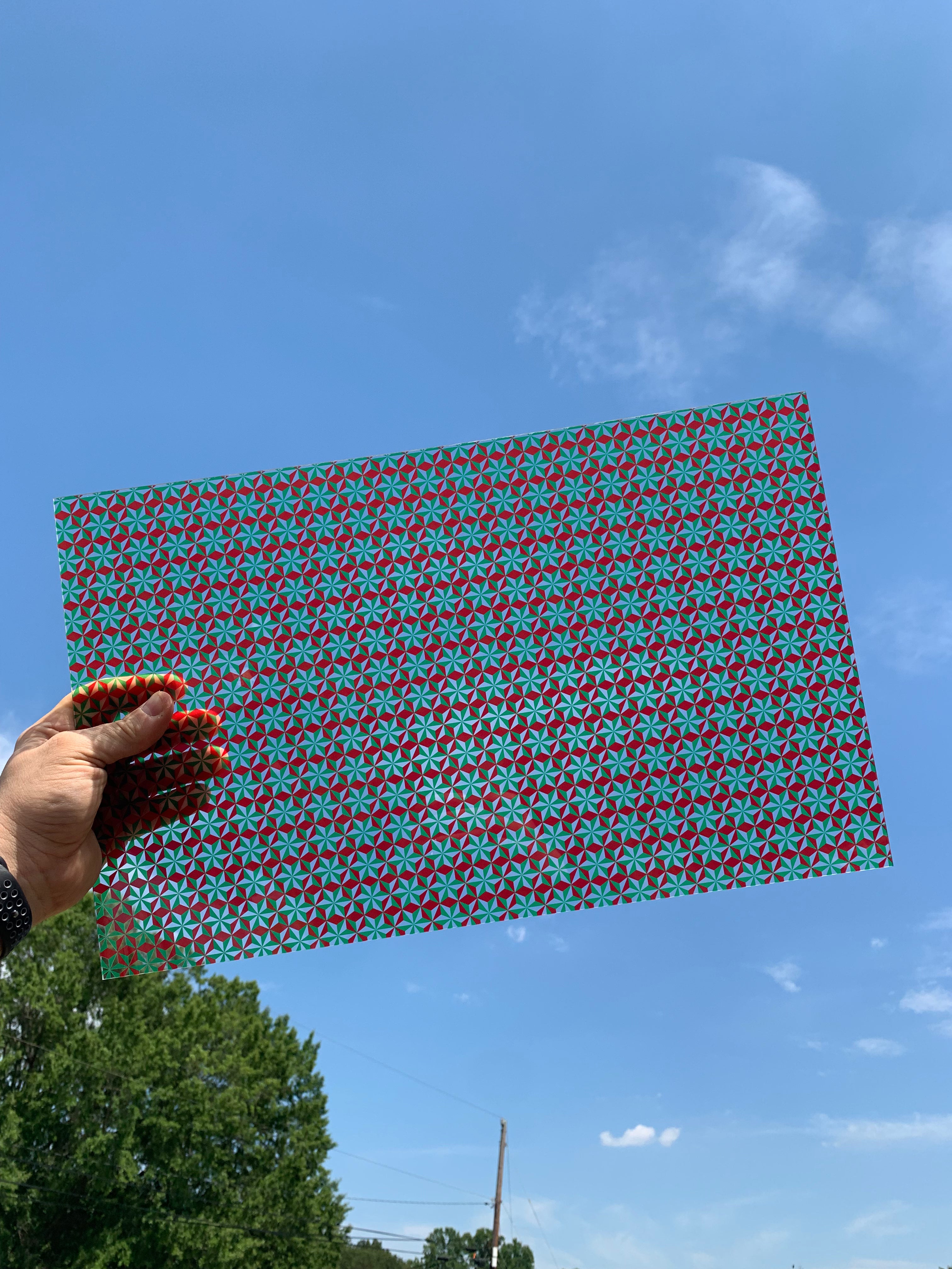 PatternPly® Transparent Red and Green Pinwheels sheet showing the pattern