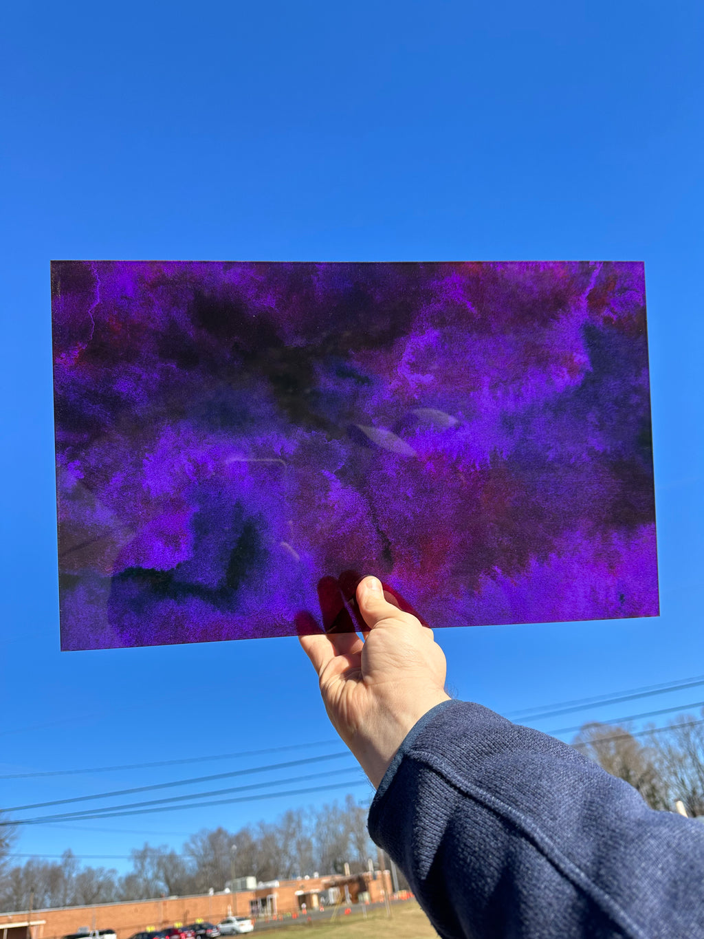 PatternPly® Transparent Magenta Ink Clouds sheet showing the pattern
