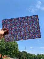 PatternPly® Transparent Rainbow Pebble Stained Glass sheet showing the pattern