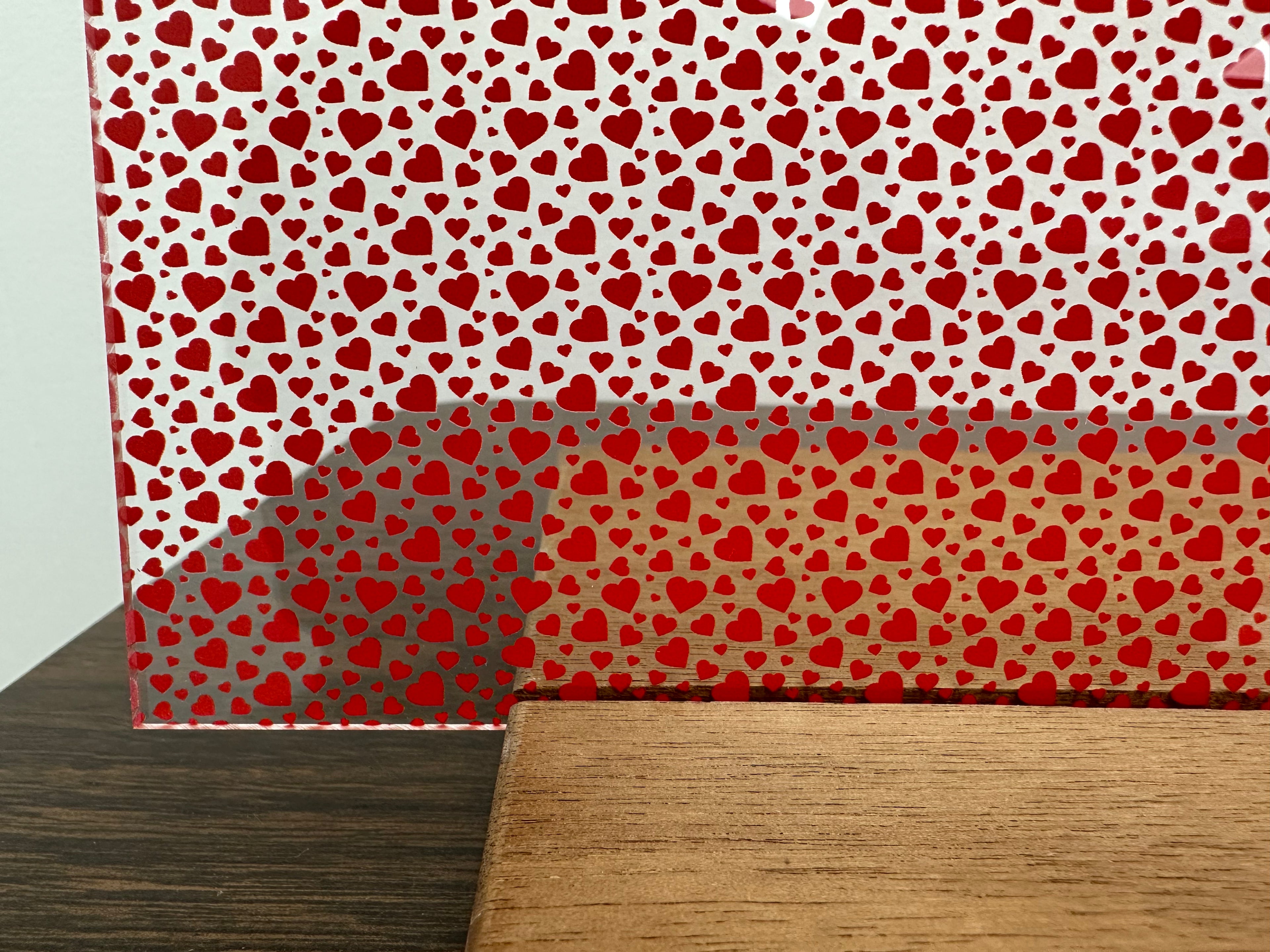 PatternPly® Scattered Micro Red Hearts sheet showing the pattern