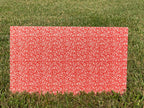 PatternPly® Full Coverage Red and White Christmas Scrolls sheet showing the pattern