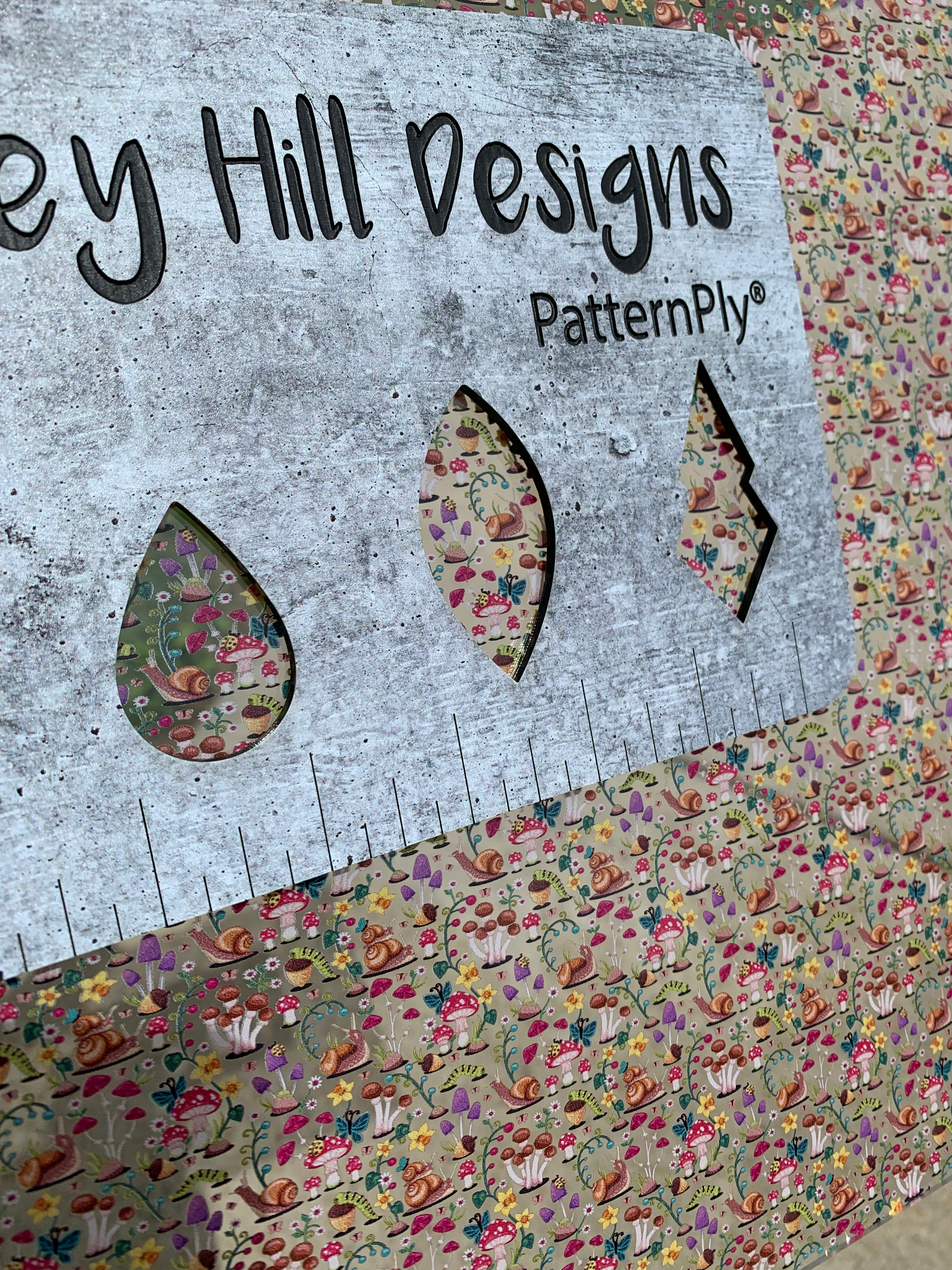 PatternPly® Scattered Snails and Mushrooms sheet showing the pattern