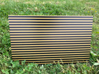 PatternPly® Full Coverage Black and Gold Stripes sheet showing the pattern