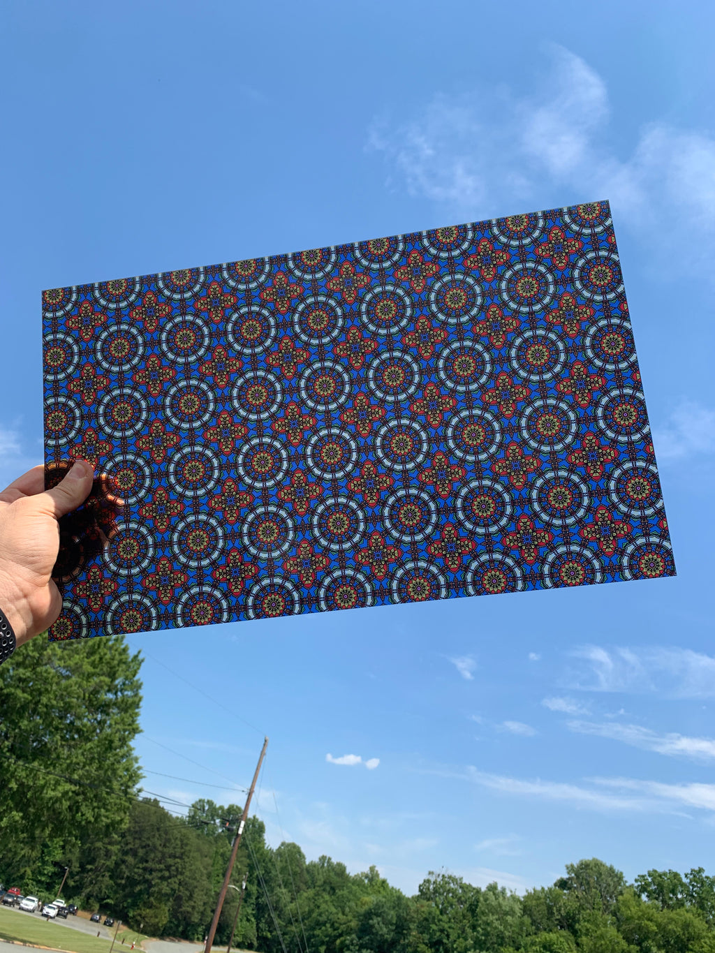 PatternPly® Transparent Blue and Red Stained Glass sheet showing the pattern