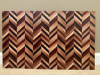PatternPly® Full Coverage Natural Herringbone sheet showing the pattern