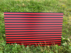 PatternPly® Full Coverage Black and Red Stripes sheet showing the pattern