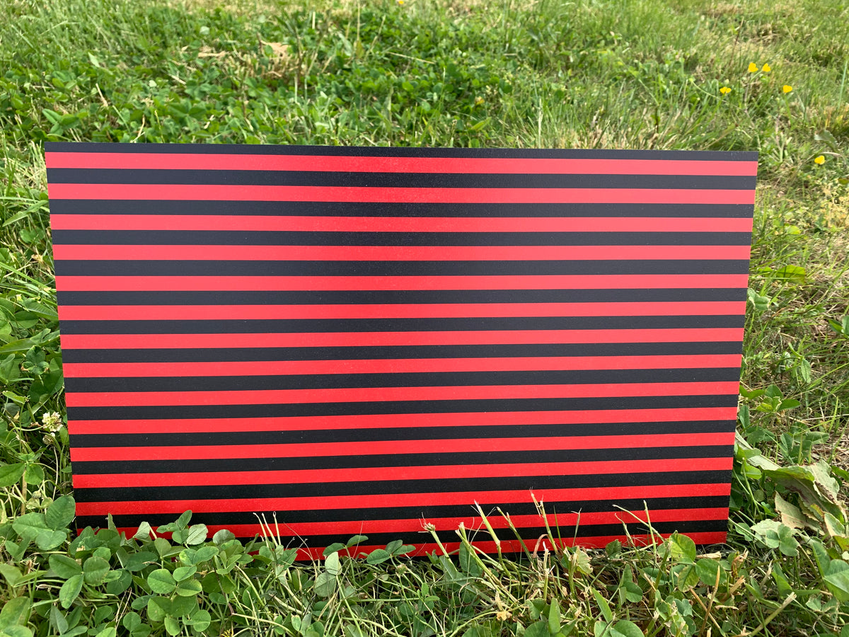 PatternPly® Full Coverage Black and Red Stripes sheet showing the pattern