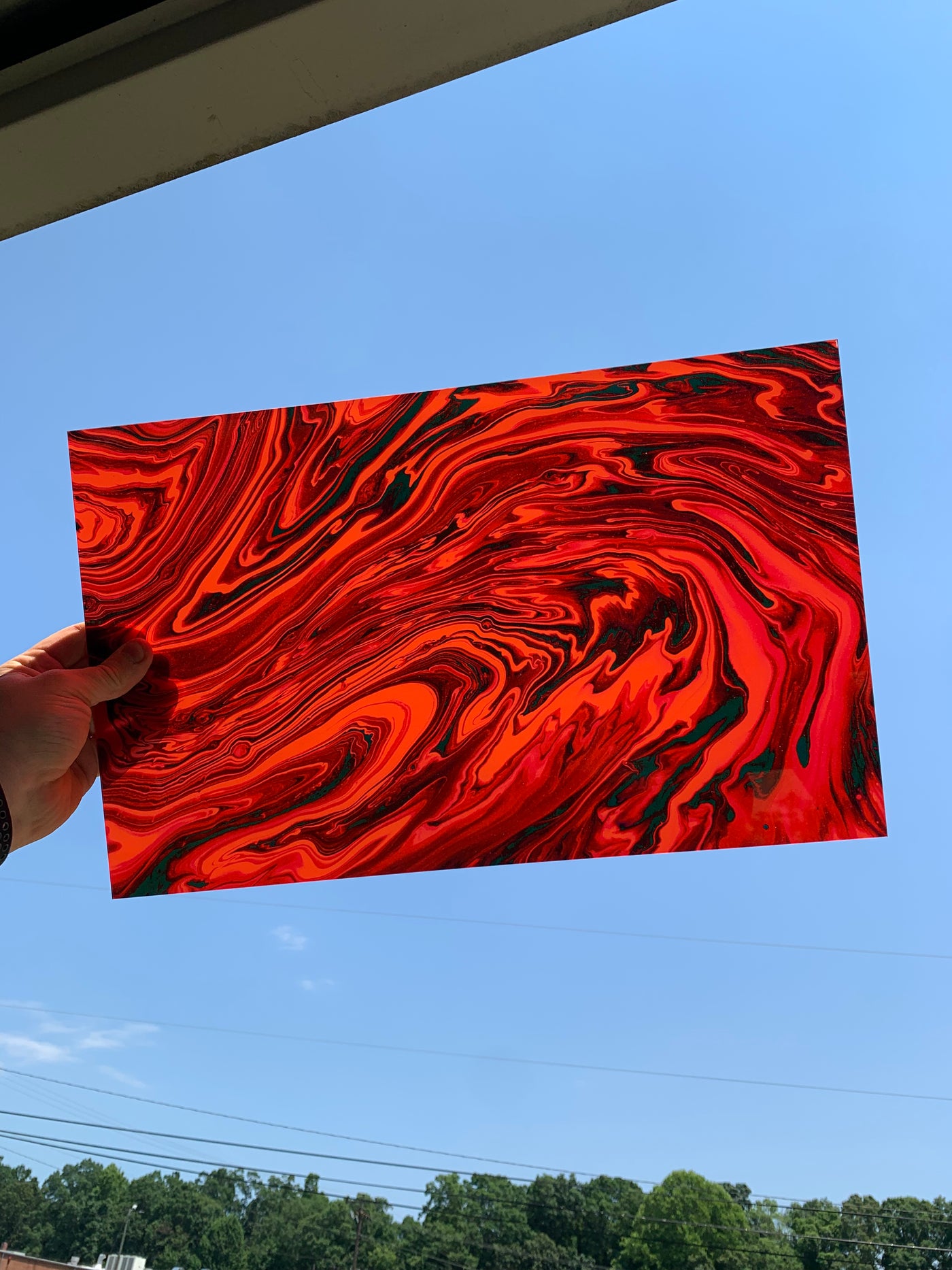 PatternPly® Acrylic Transparent Red and Black Swirls