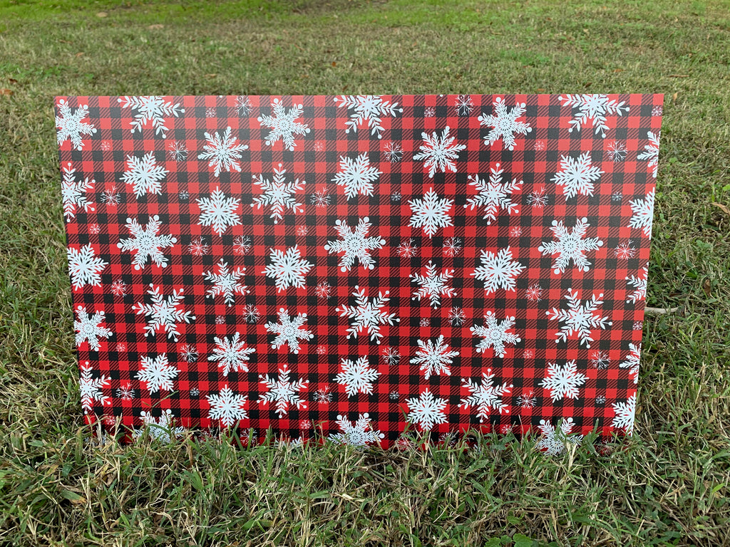 PatternPly® Full Coverage Red Snowflake Buffalo Plaid sheet showing the pattern